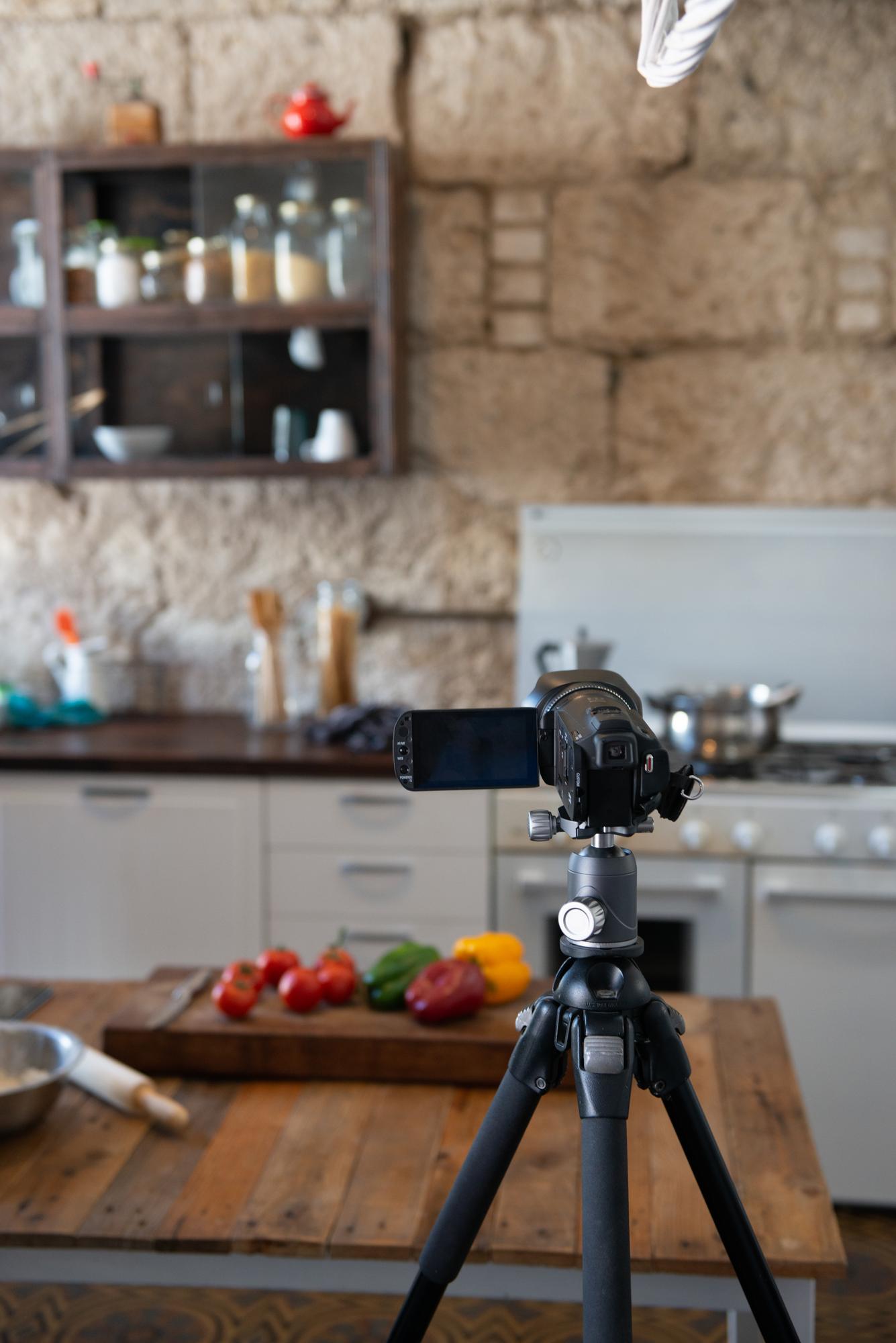 Online cooking studio workspace with camera and lights